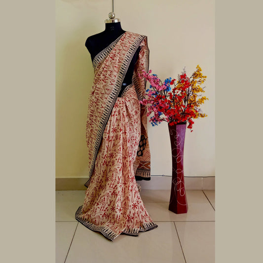 Elevate your summer style with our Pure Cotton Jaipuri Hand Block Printed Saree. Crafted with care and adorned with traditional block prints, this saree comes with a matching blouse piece. Embrace comfort and elegance this season! - Fabcentra
