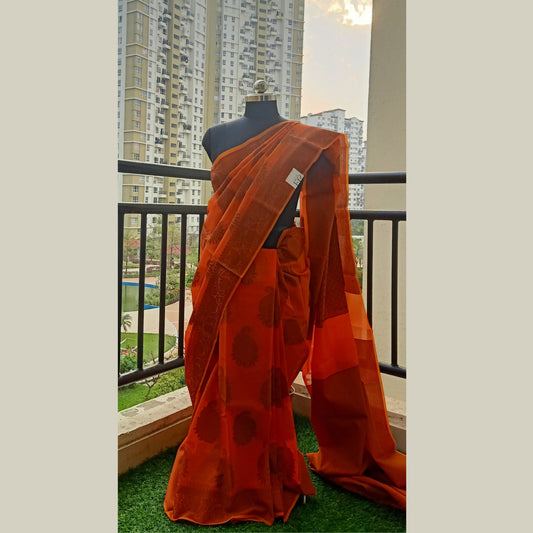 Kota Saree, where every thread tells a story of craftsmanship. Complemented by a matching blouse piece. The mesmerizing pallu adds a touch of finesse, making each saree a masterpiece of tradition and contemporary style. - Fabcentra