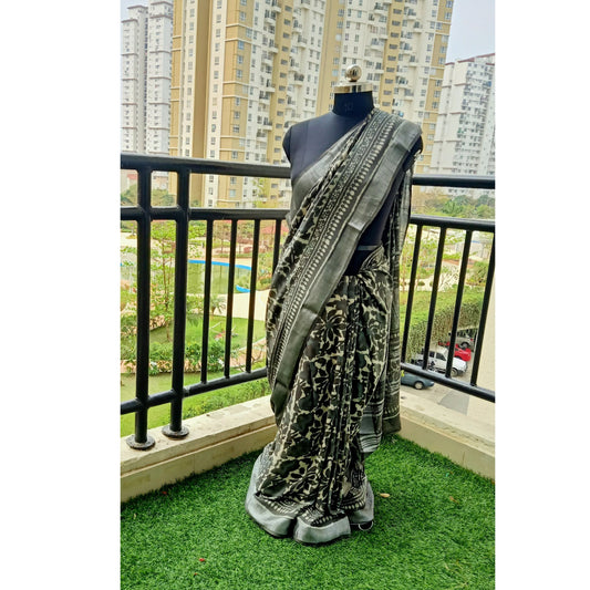 Linen Cotton Batik Print Saree. Each saree comes with a matching blouse piece, perfect for completing your traditional ensemble. Explore our collection now! - Fabcentra
