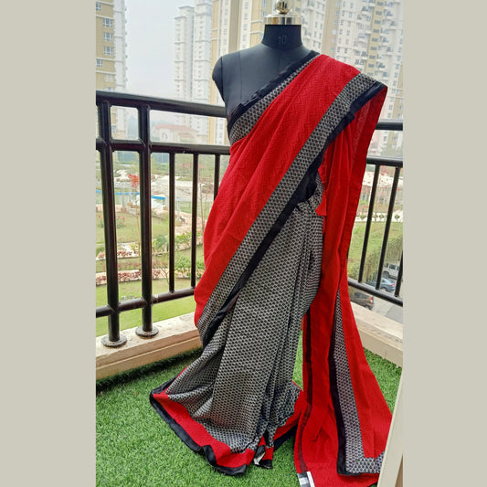 Cotton saree with half & half designer motif. In red hand block print & black weaving with alternative border & blouse piece